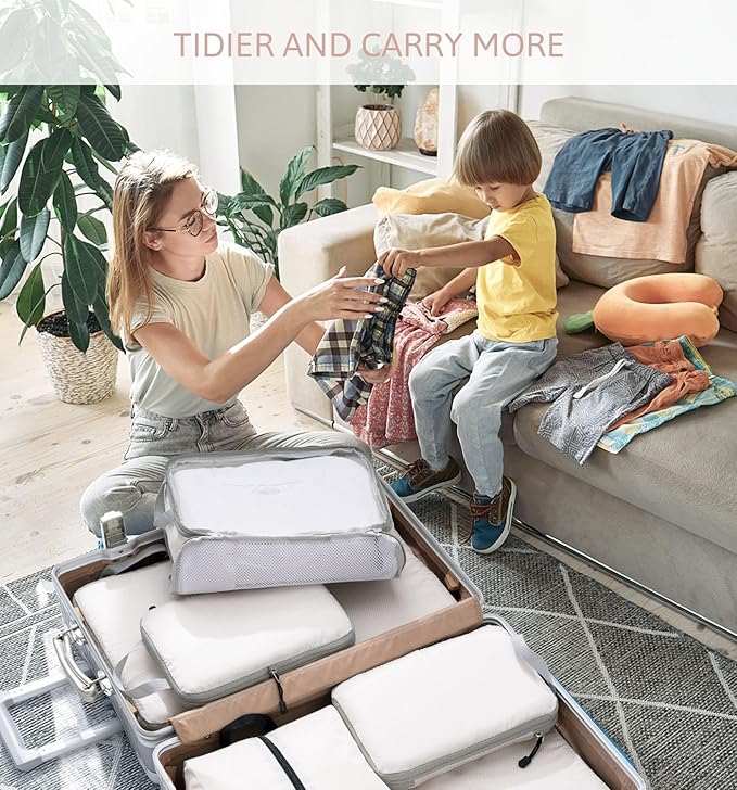 Mother and child using packing cubes to organize clothes neatly in a suitcase before travel.