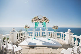 elegant-wedding-arch-with-fresh-flowers-vases-on-2025-01-10-20-36-57-utc.jpg