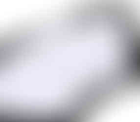 Close-up of inner white cotton lining of a black reusable face mask with ear loops.