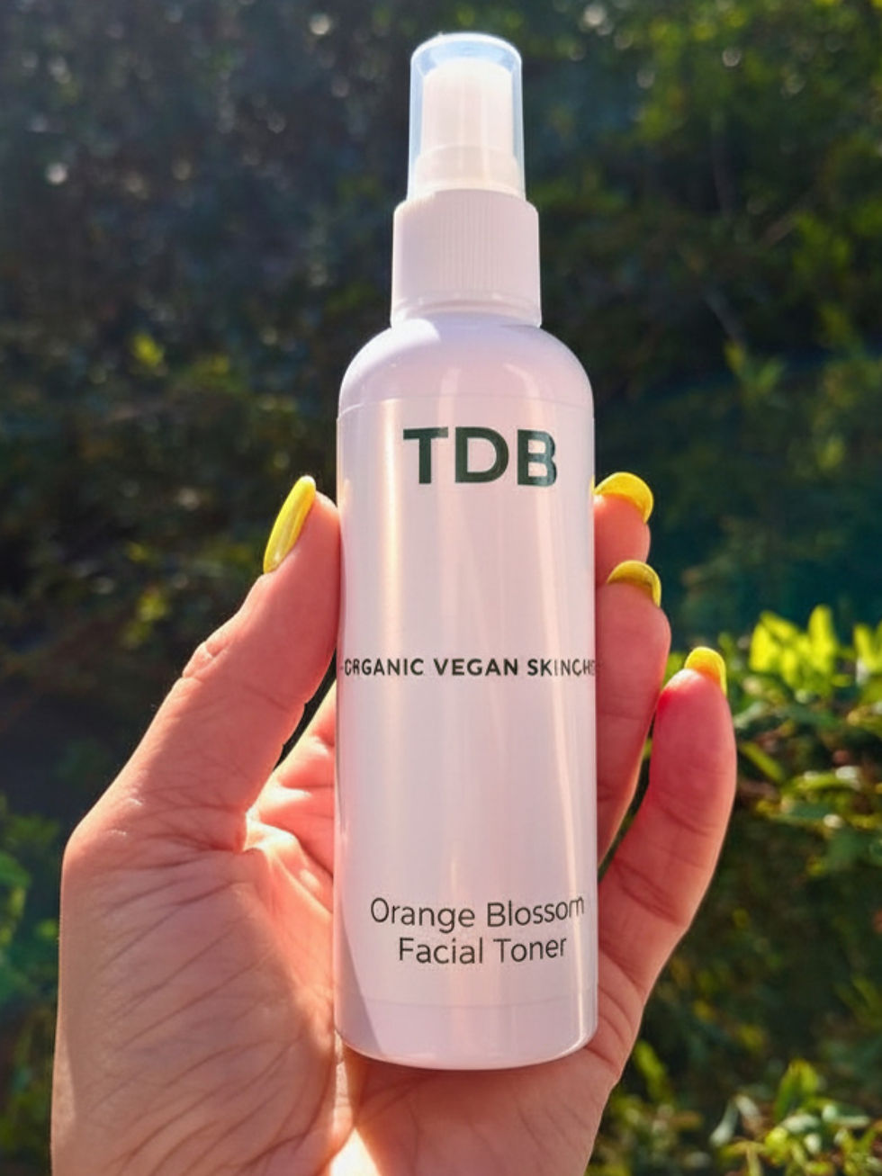 Hand holding organic vegan toner by Third Day Botanics.