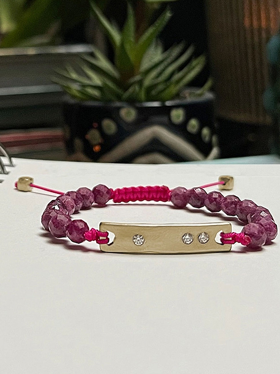 Beaded bracelet - the BAR: mezzo, 14K solid yellow gold, 2 diamonds, the BEAD: 14K solid yellow gold, the GEM: sapphire