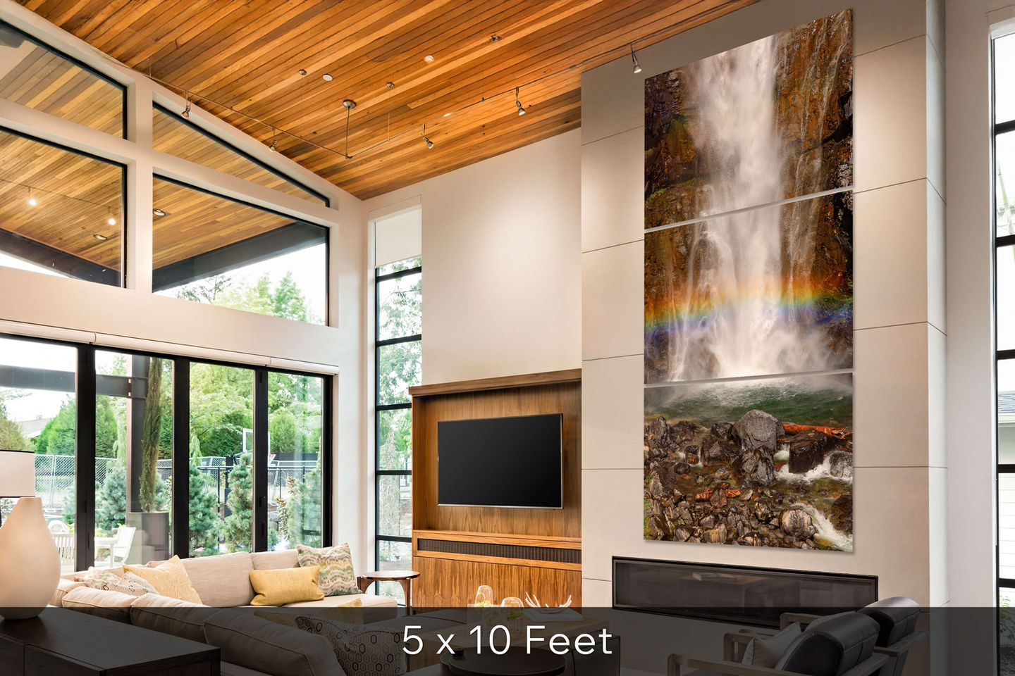 Three-panel Rainbow Falls vertical print next to television