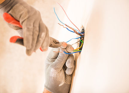 electrician stripping cable