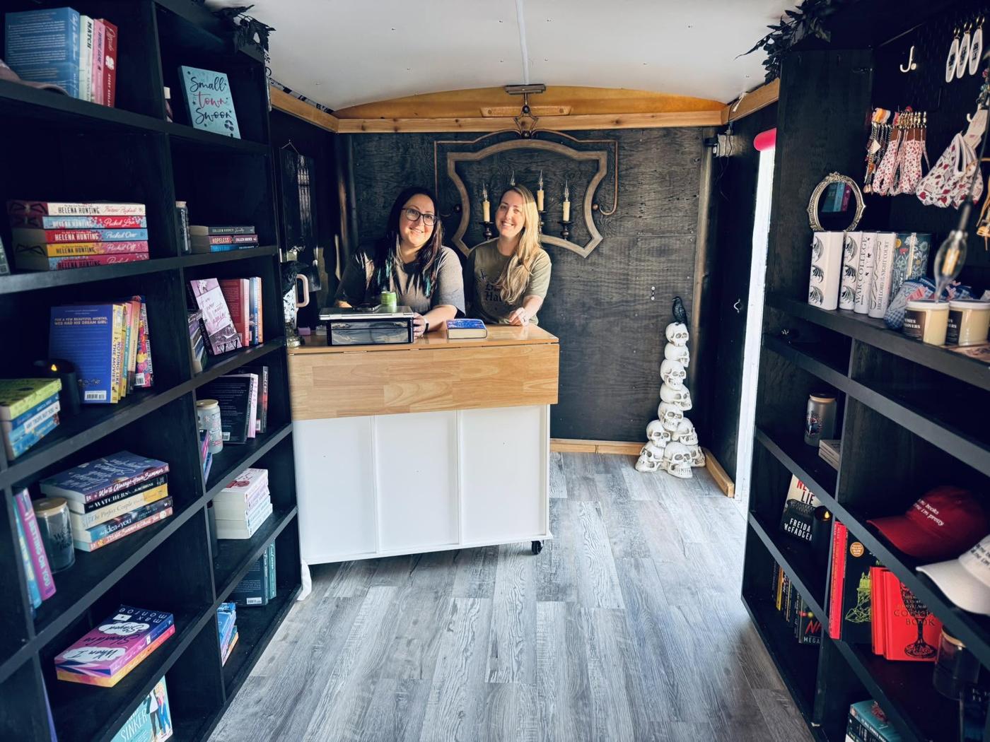 Inside The Book Haul trailer: bookshelves, the merch wall, and the checkout counter