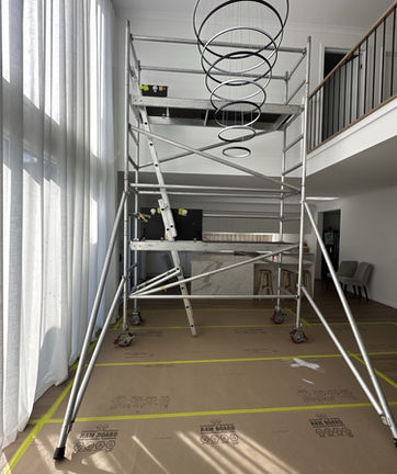 Indoor scaffolding set up for a high-ceiling renovation.