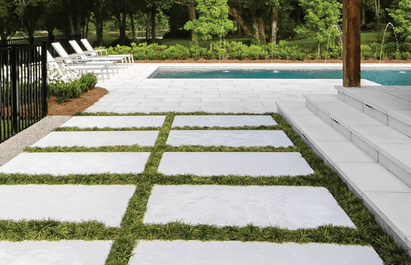 grassy-joints-concrete-pavers-pool-deck.png