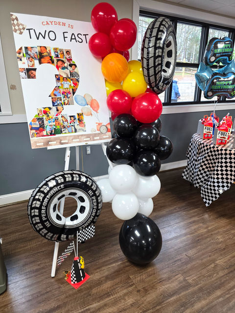 Racing themed special event decor for a two-year-old birthday in Gastonia.