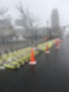 MVB3X barrier units covered in snow with traffic cones, forming a secure perimeter along a city street