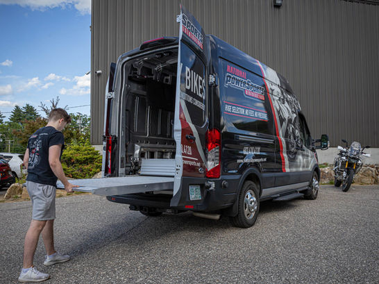 The ramp deck stows beneath a 6" subfloor that is installed on top of the vehicle floor.
