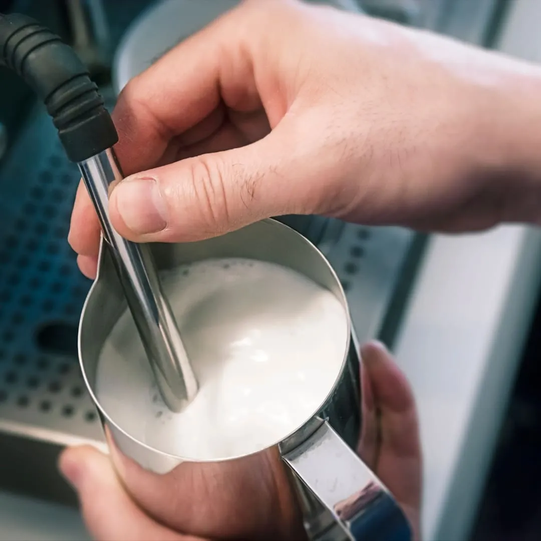  use the steam wand of your coffee machine to froth the milk