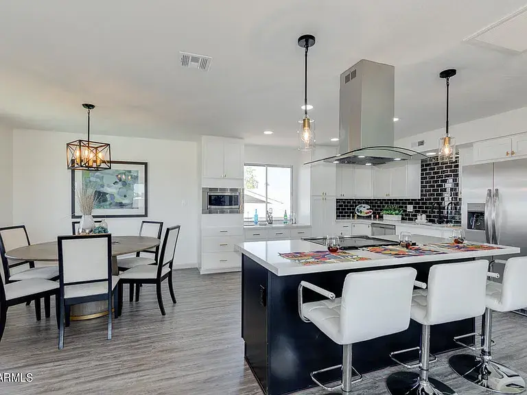 Fully remodeled kitchen in Glendale featuring modern fixtures, custom cabinets, upgraded plumbing, and new countertops.