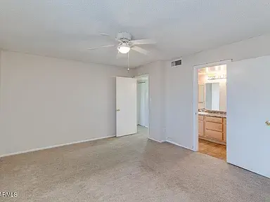 Before new fixtures, ceiling fans, luxury vinyl planking, new baseboards, new carpet
