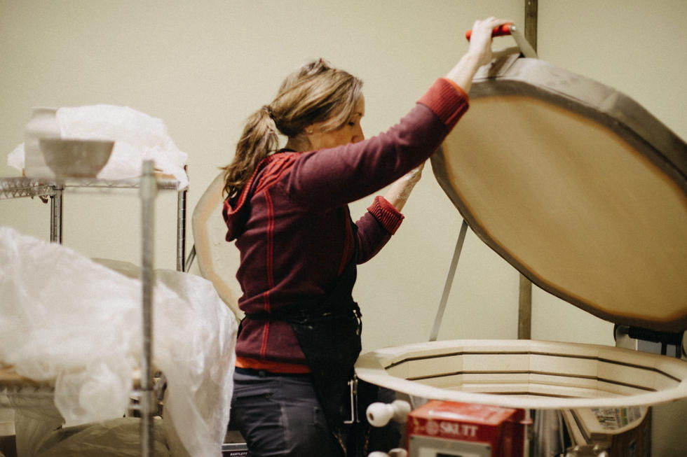 Loading the pottery kiln