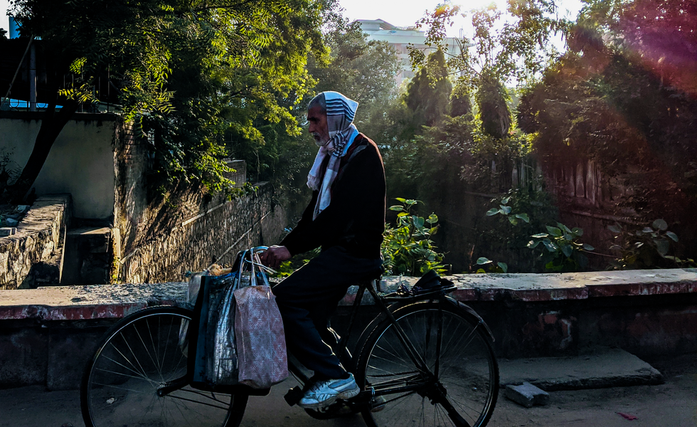 Old man on a bicycle.png