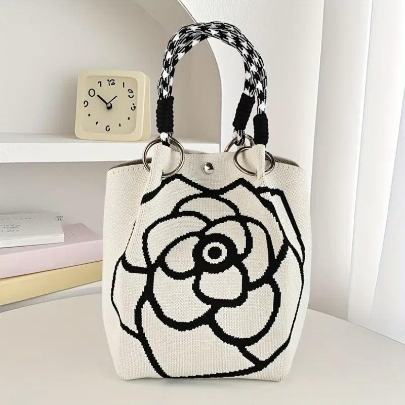 Thumbnail: White knit handbag with black flower and braided handle