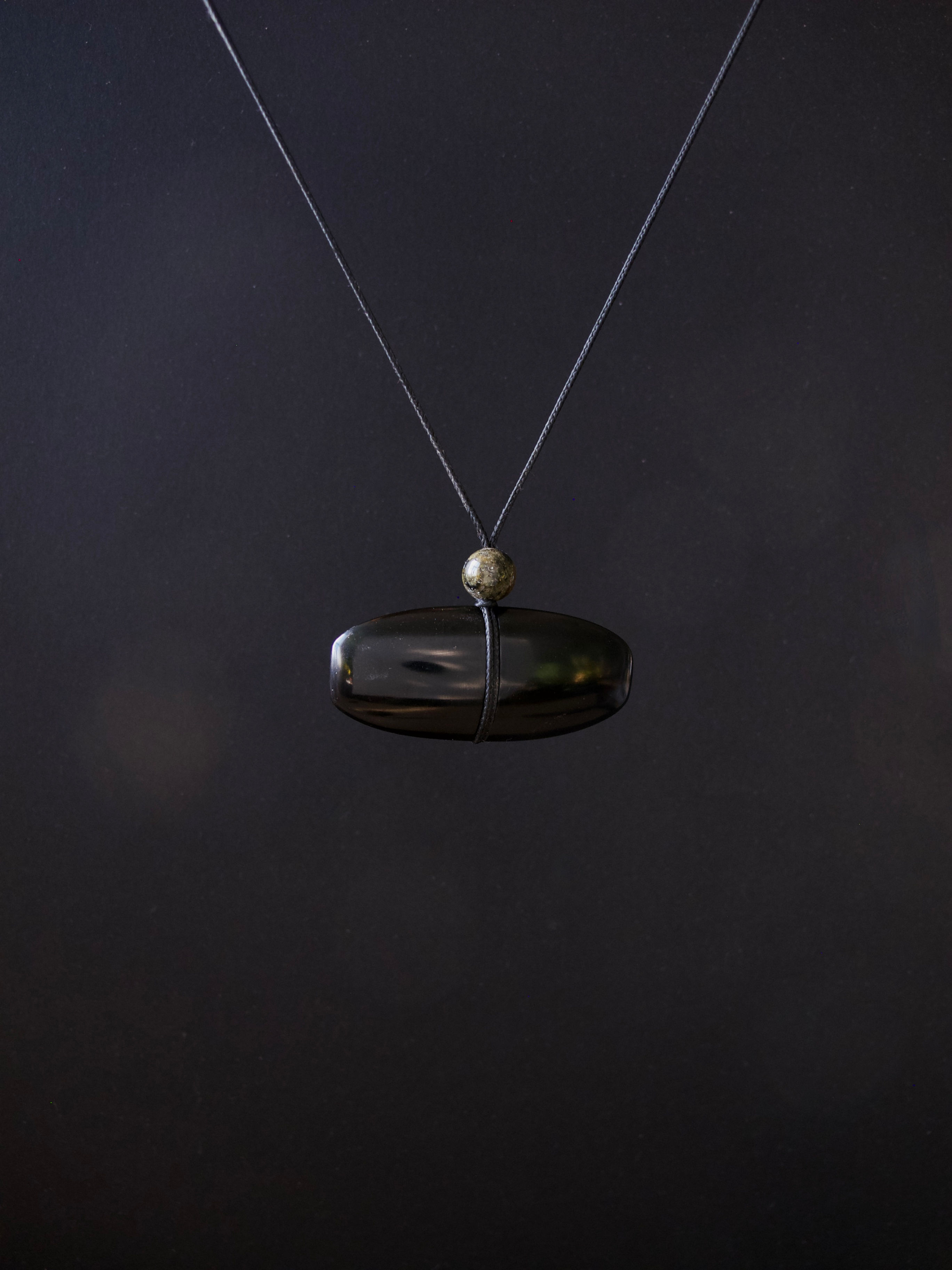 Horn Pendant with Grossular Garnet