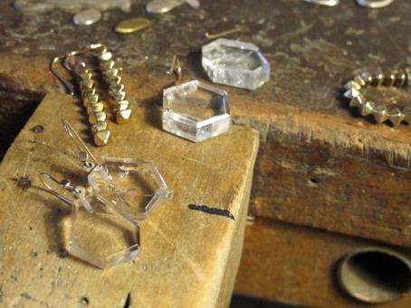 Facets in brass or crystal