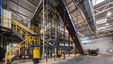 Premium-Photo-Modern-waste-recycling-processing-plant-separate-garbage-collection-recyclin