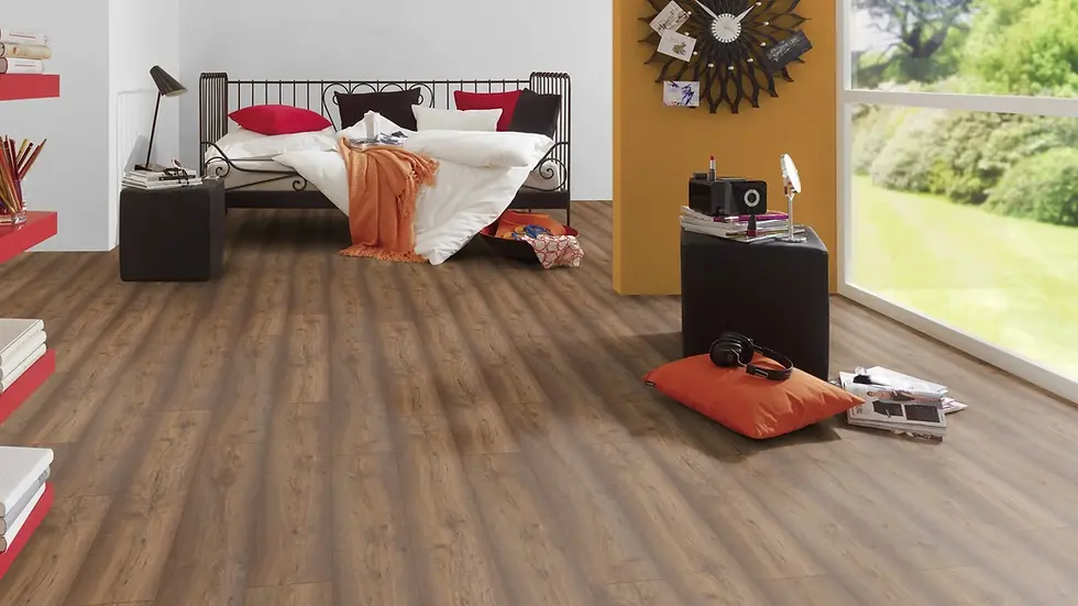 Close-up of Habana Oak laminate floor by Canadia showing realistic oak woodgrain and rich textured finish.