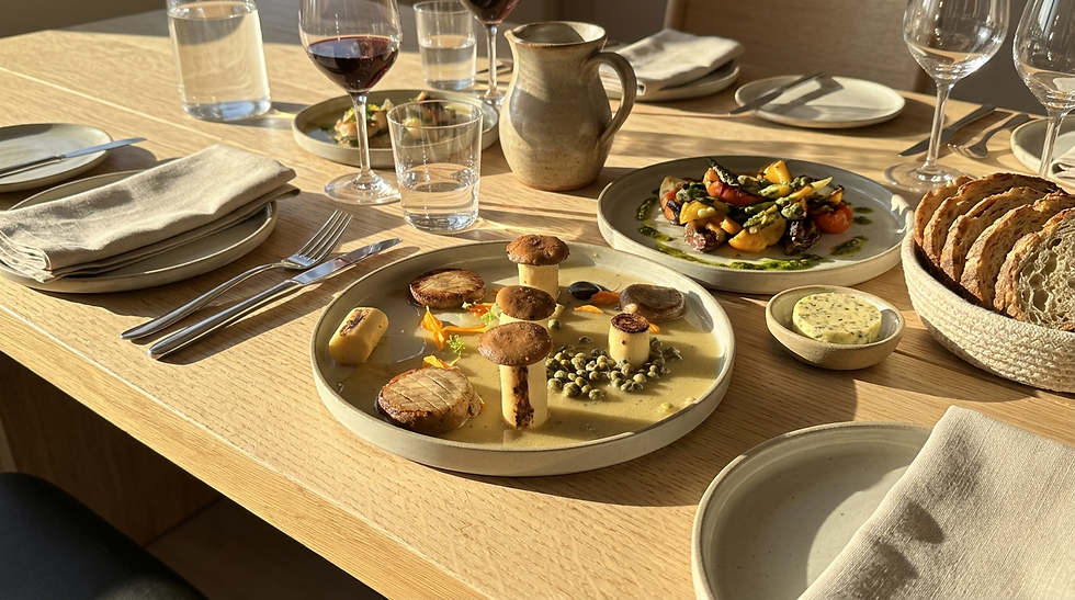 Plated chef dinner with wine at an outdoor dining table on a Costa Rica retreat