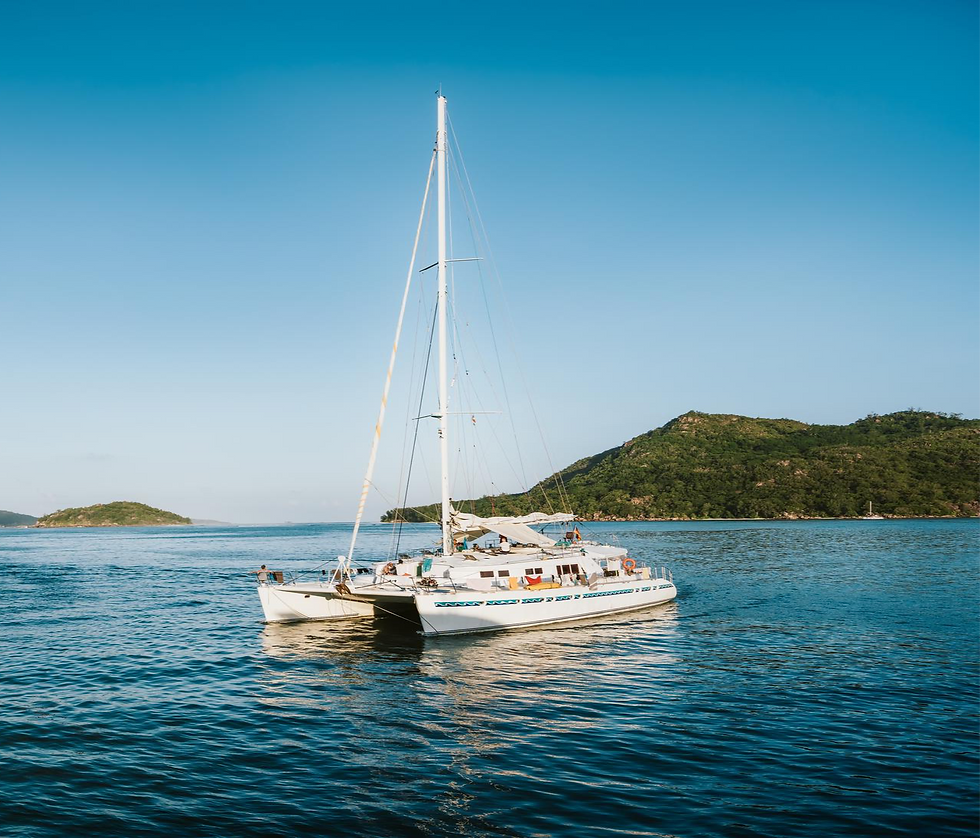 Private catamaran sailing along the coast during a corporate retreat in Costa Rica