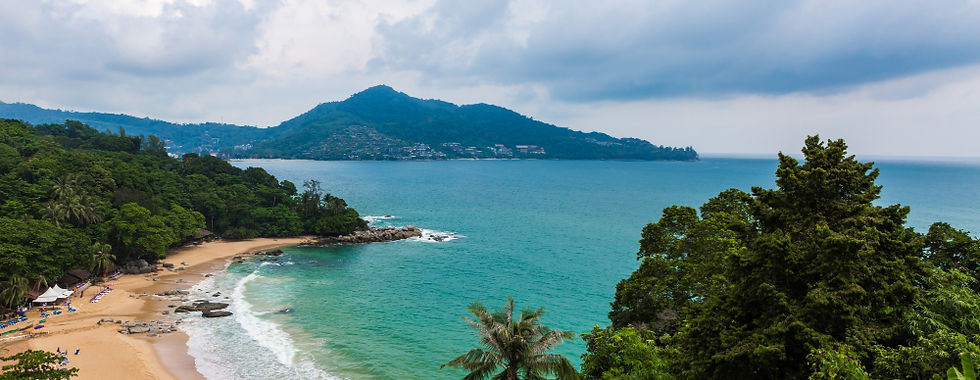 Turquoise bay and forested coastline, a setting for a wellness retreat in Costa Rica