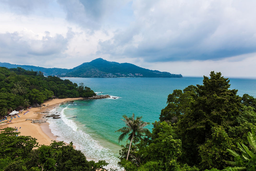 Tropical beach cove with turquoise water and rainforest hills, a scenic setting for a retreat in Costa Rica