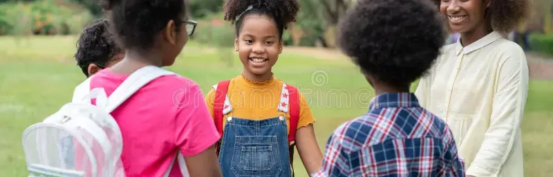 happy-african-american-childrens-standing-holding-hands-together-circle-park-education-out