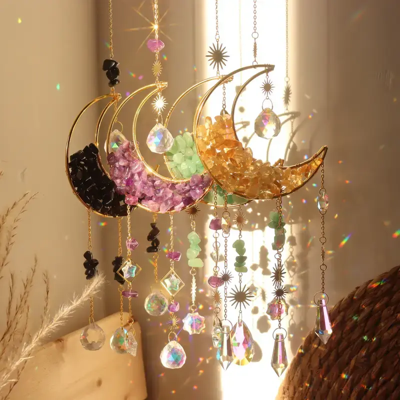 Crescent moon suncatchers in black, purple, green, and orange