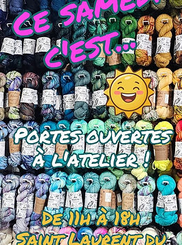 multicolored yarn skeins announcing the event