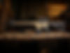 close-up-sniper-gun-showcased-table.jpg