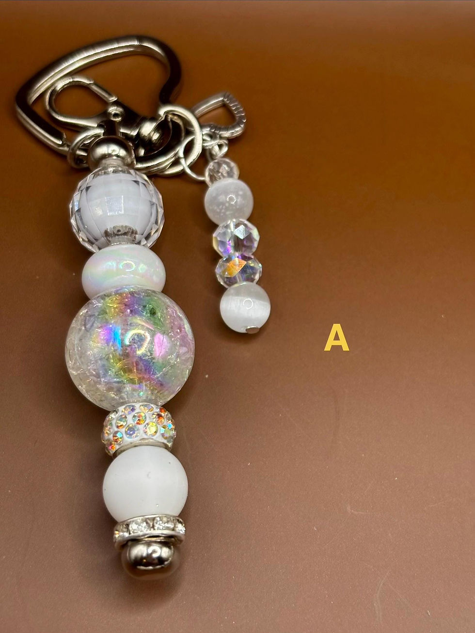 White beaded keychain with pearl and rhinestone accents