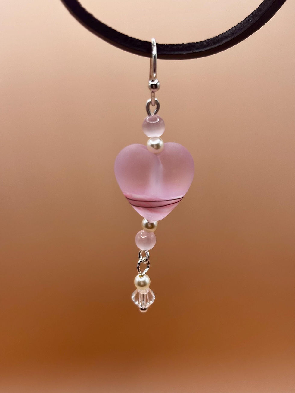 Thumbnail: Frosted pink heart earring with lampwork glass beads.