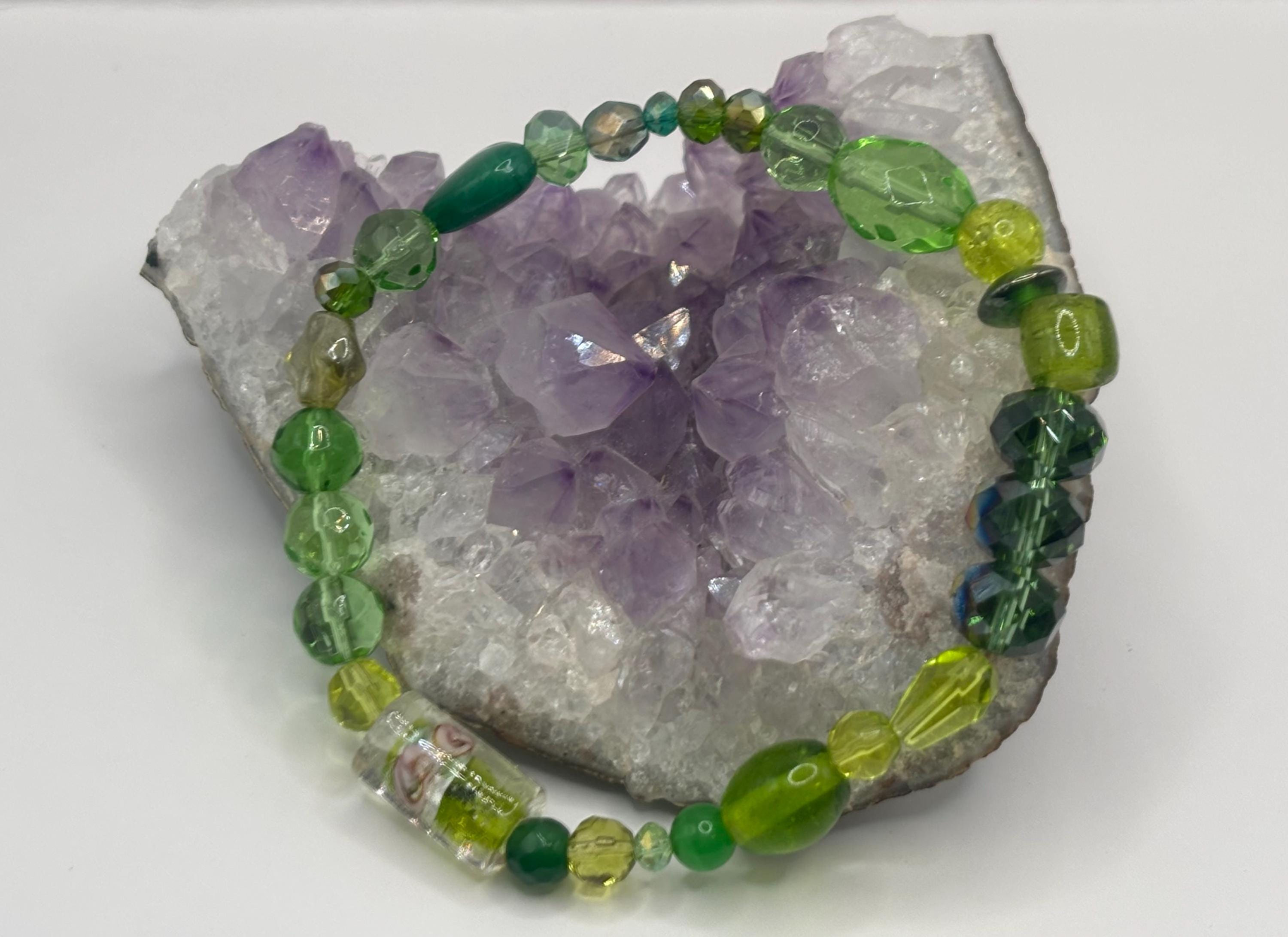 Green lampwork stretch bracelet with artisan glass beads.