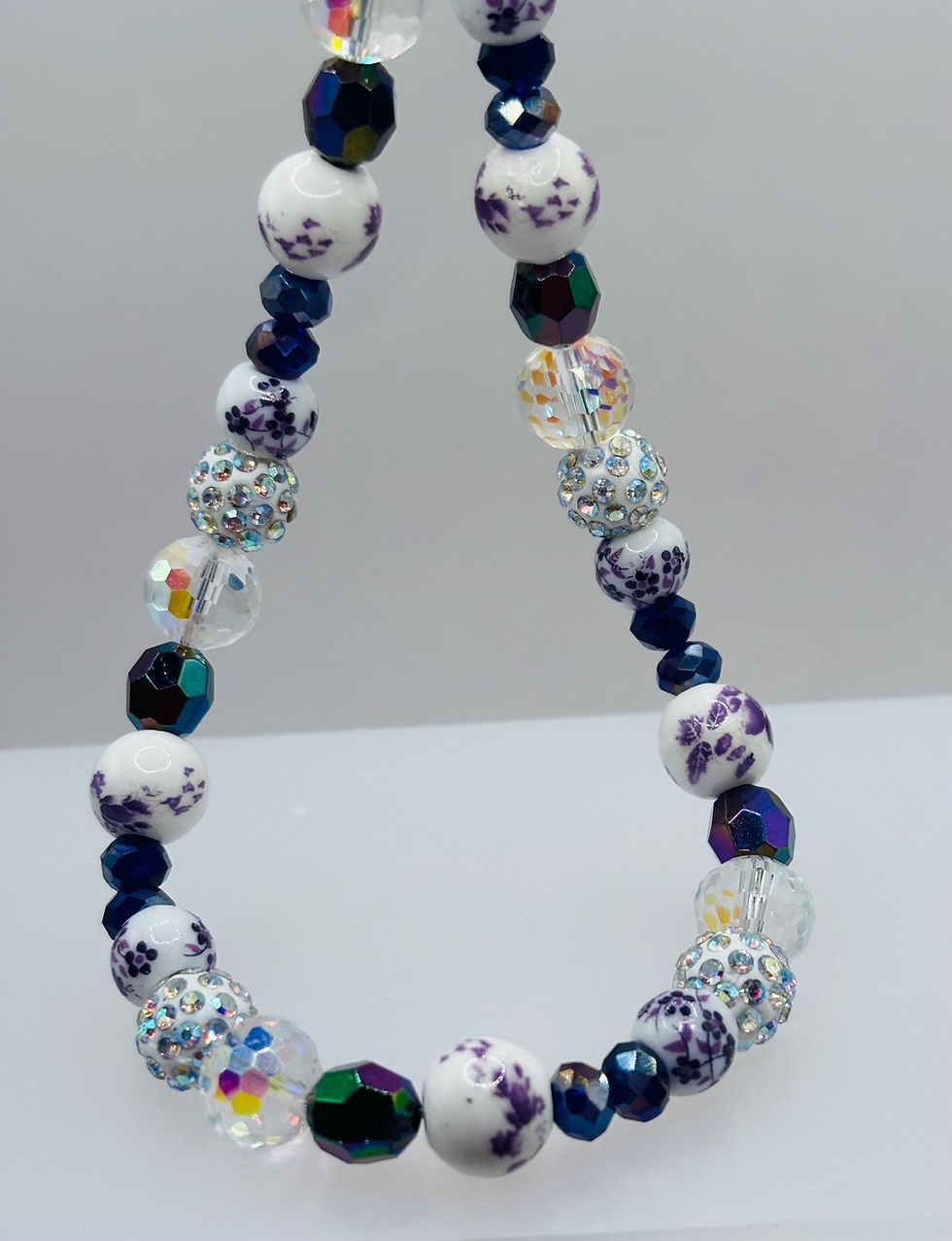Thumbnail: Purple floral and crystal beaded phone charm with ceramic beads