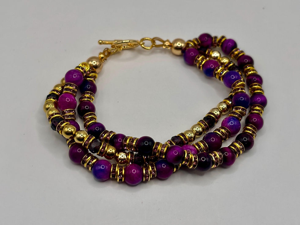 Thumbnail: Triple strand purple gemstone bracelet with gold accents