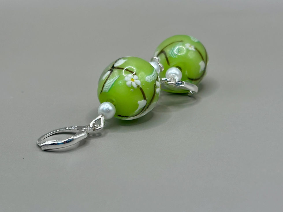 Thumbnail: Green floral silver heart dangle lampwork bead earrings