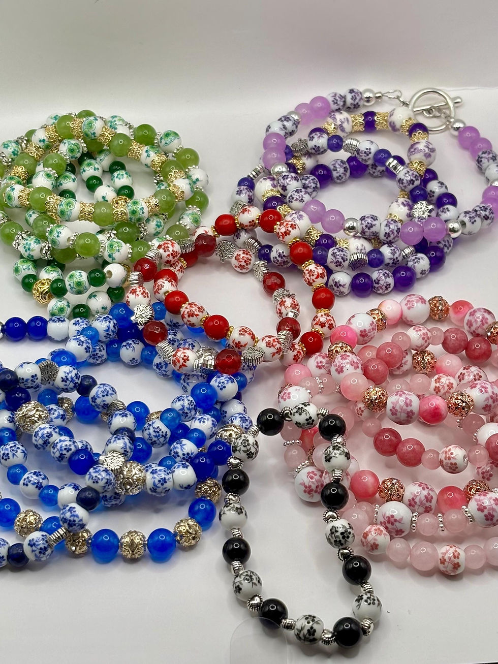 Thumbnail: Hand painted floral porcelain beaded bracelets in various colors