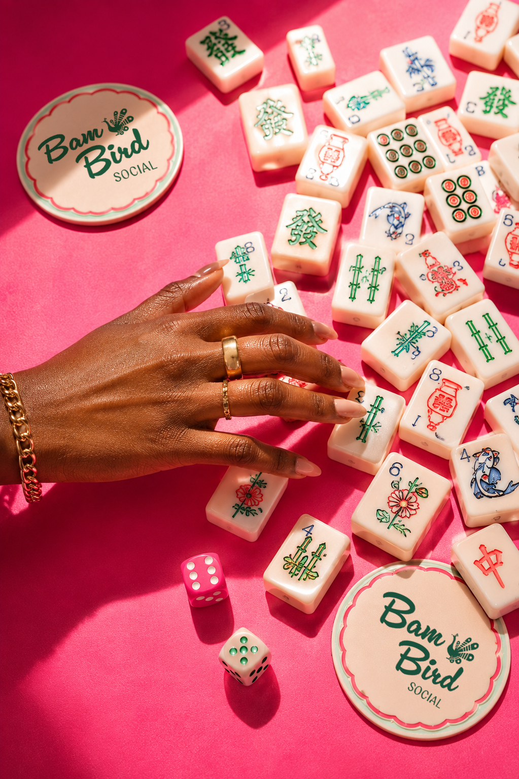 Hand reaching for mahjong tiles