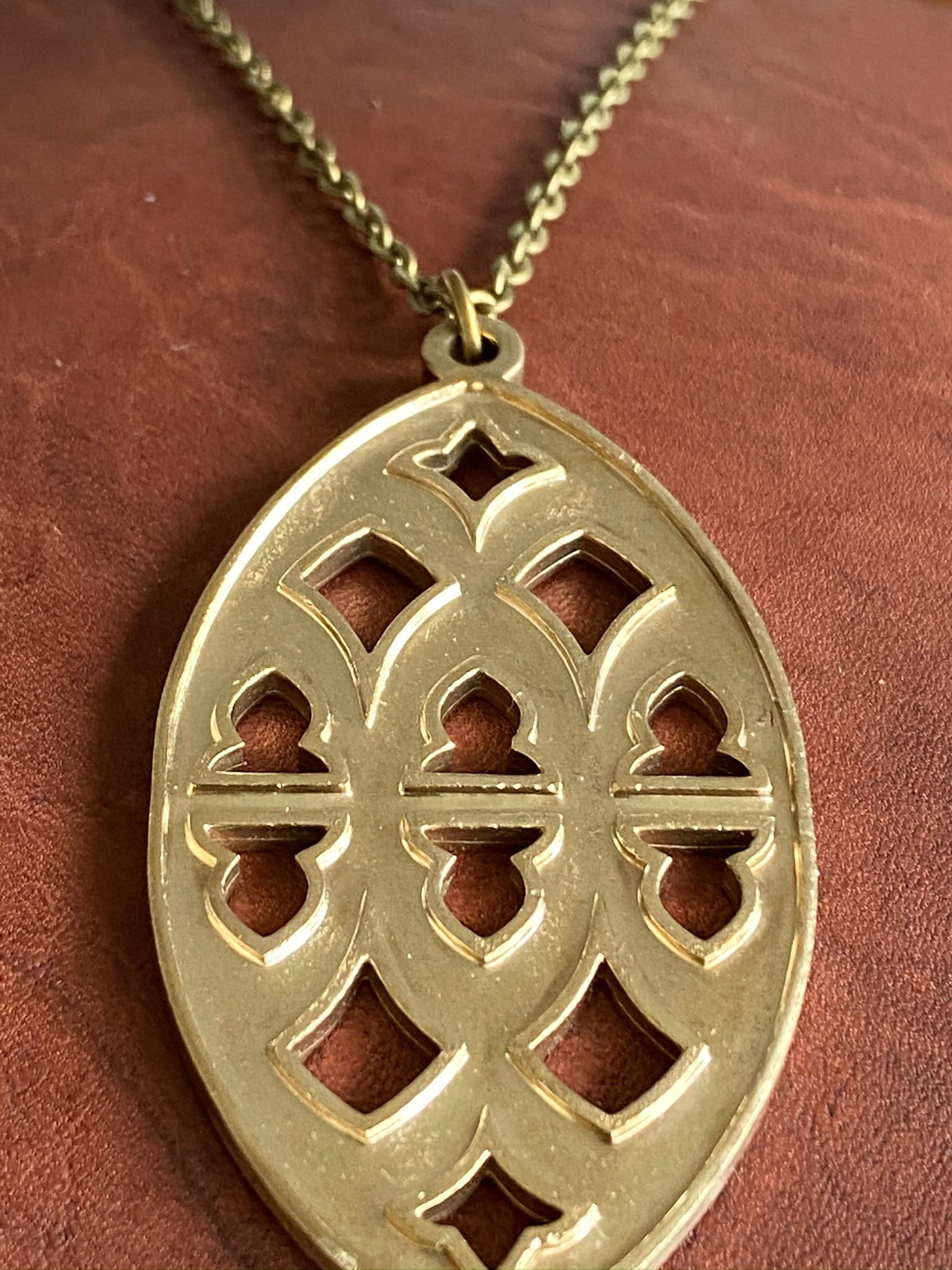 Strawberry Hill pendant: brass with cut out detail