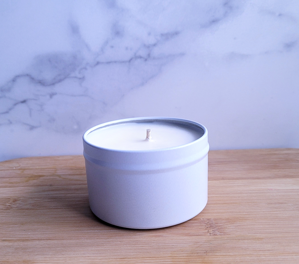 KBS Home Sunkissed Plum handpoured soy candle in white tin on bamboo board with marble background
