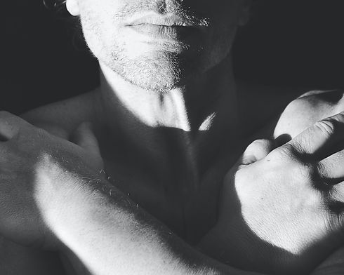 naked man's chest arms crossed