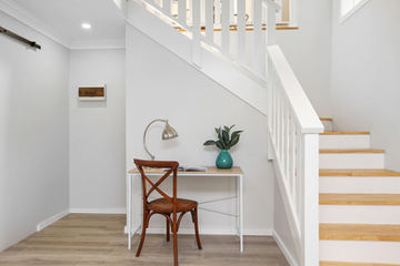 new staircase to connect the upstairs of the home with the downstairs.