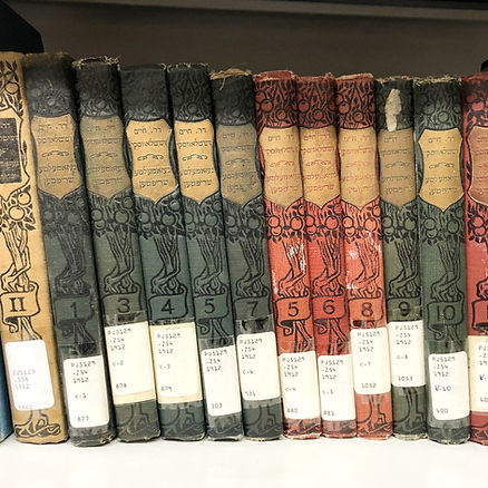 Photo of a row of books in the Kirman Library at the Peretz Centre