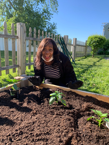 Come on now... How cute is Marie! And so proud for planting her very first plant!!