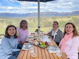Me and my three sisters at Dryridge Estate, with our Ploughman's Platter and wine glasses ready for tasting