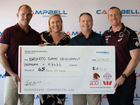 Campbell Construction Co presenting cheque