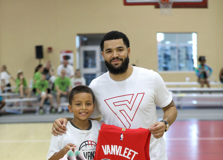 FVV with kid shoes jersey.jpg
