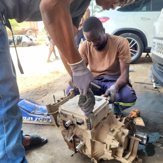 BOOST trainees gaining hands-on experience with electric vehicles and components