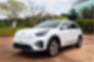 A white Kia e-Nero electric car